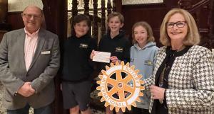 Troon Tennis Club Juniors receiving a TRCS £200 cheque.